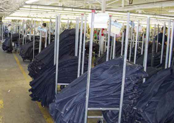 Finished jeans on racks before packing